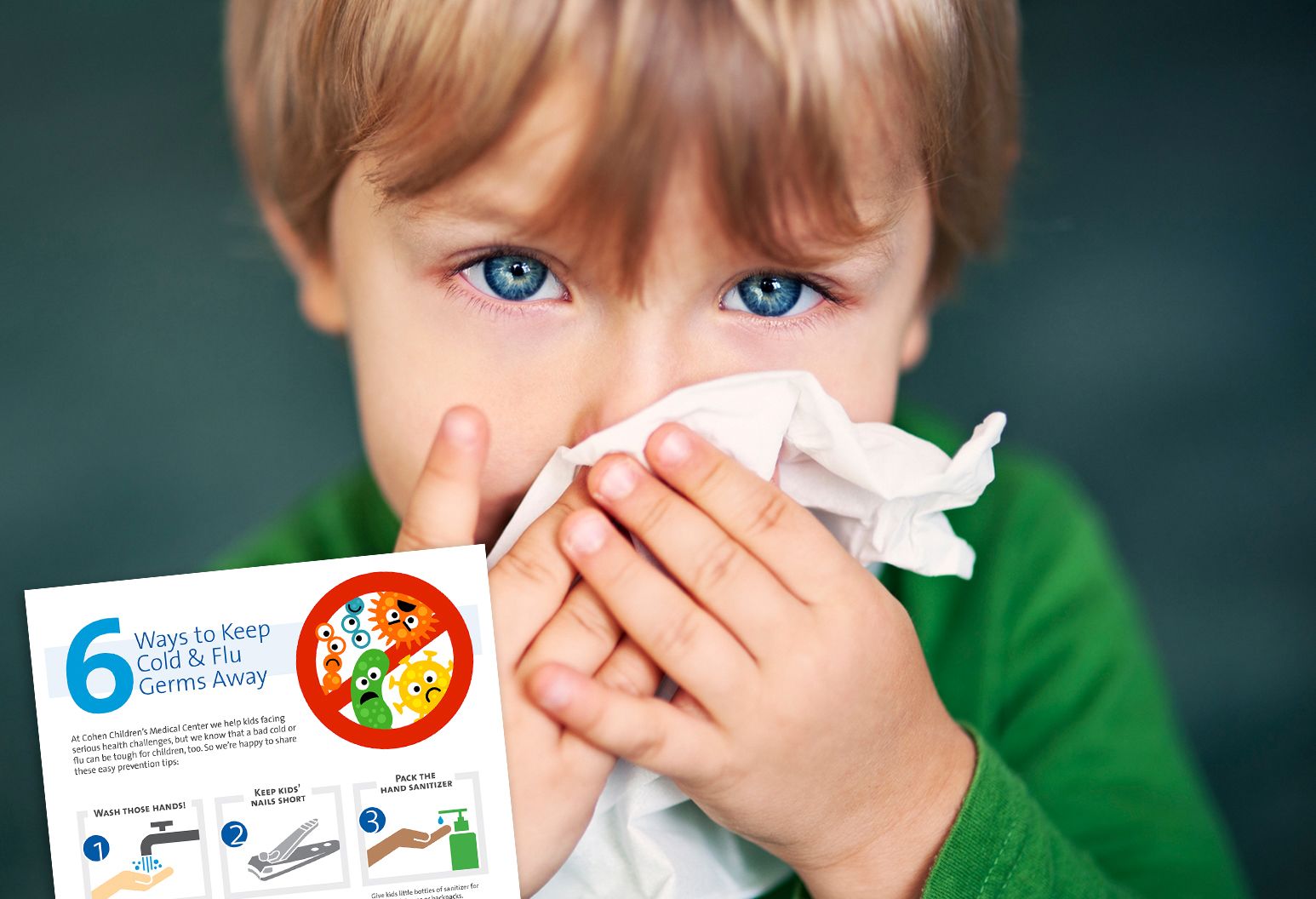 A child wearing a green shirt using a tissue to blow their nose.